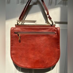 Simple Red All Leather Shoulder Bag, saddle bag style. Zipper closing each side.